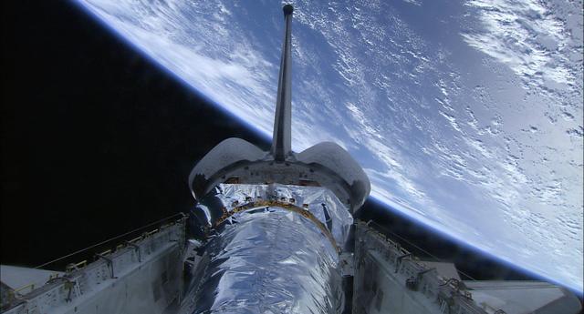 Views of the Chandra telescope take with HDTV on STS-93 photography by guiiu on Glass Gallery