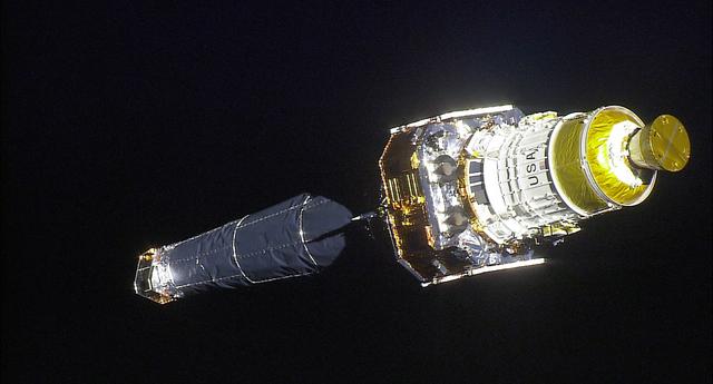 Views of the Chandra telescope take with HDTV on STS-93 photography by guiiu on Glass Gallery